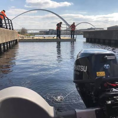 Safety boat working on the River Tees near the Infinity Bridge